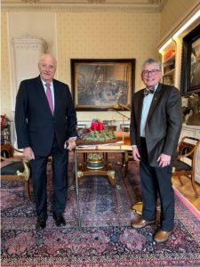 King Harald V of Norway and President Paul Pribbenow smile side-by-side following the conferral of an honorary Augsburg degree on King Harald.